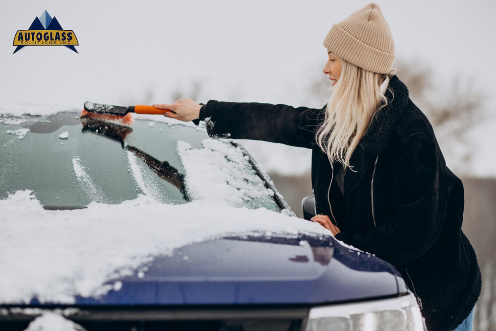 Defrosting Windows Using an Ice Scraper